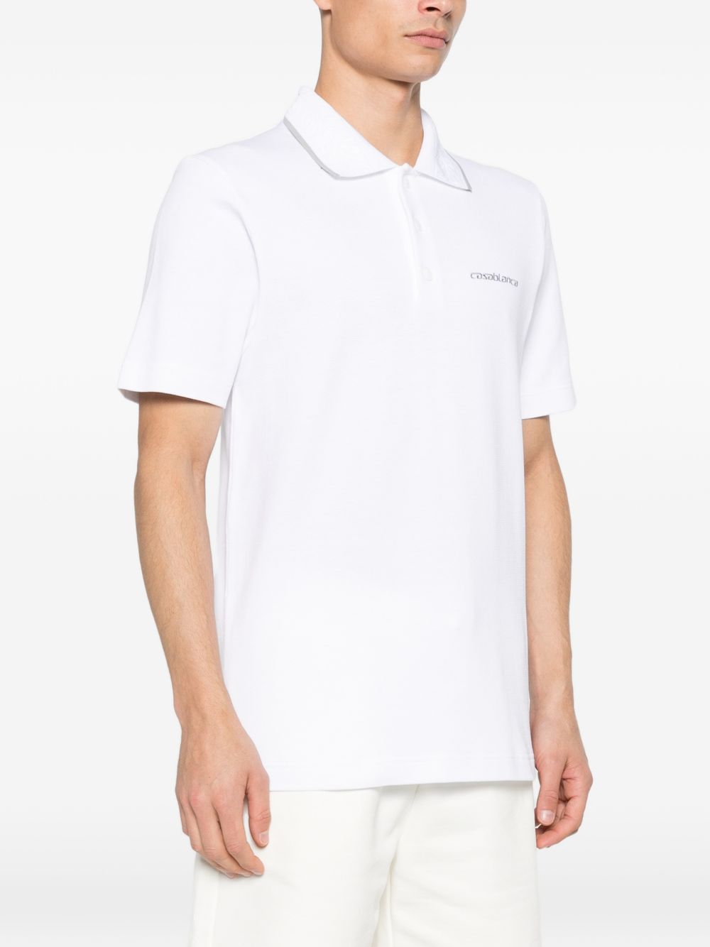 Polo con logo ricamato in bianco Casablanca - uomo 