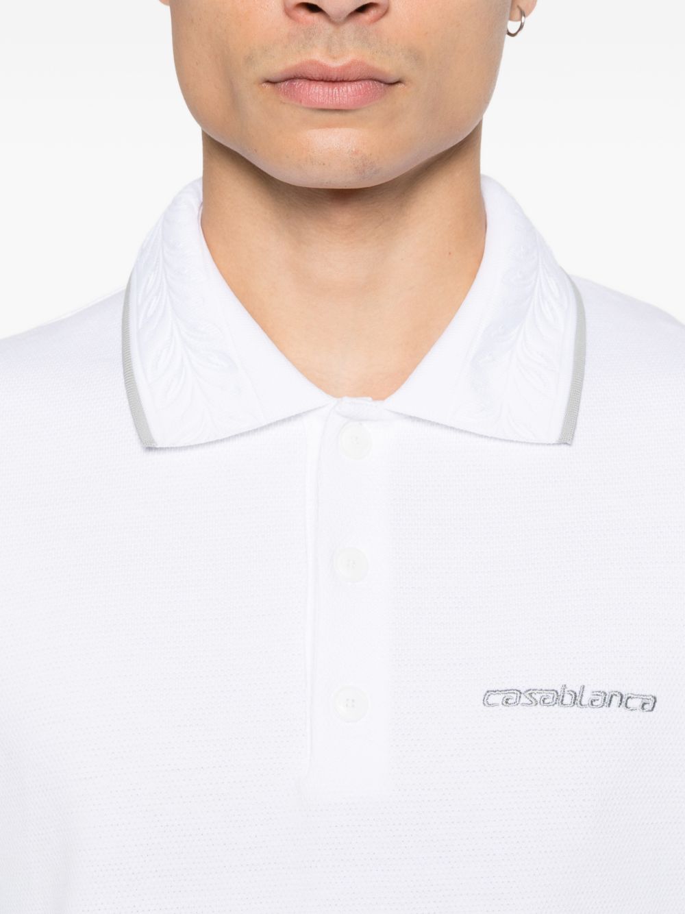 Polo con logo ricamato in bianco Casablanca - uomo 