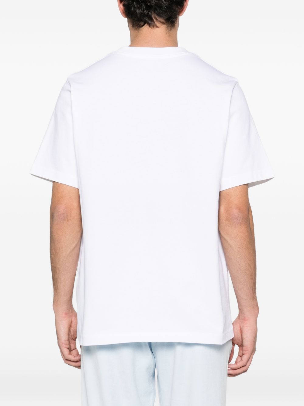 T-shirt a maniche corte con stampa grafica in bainco Casablanca - uomo 
