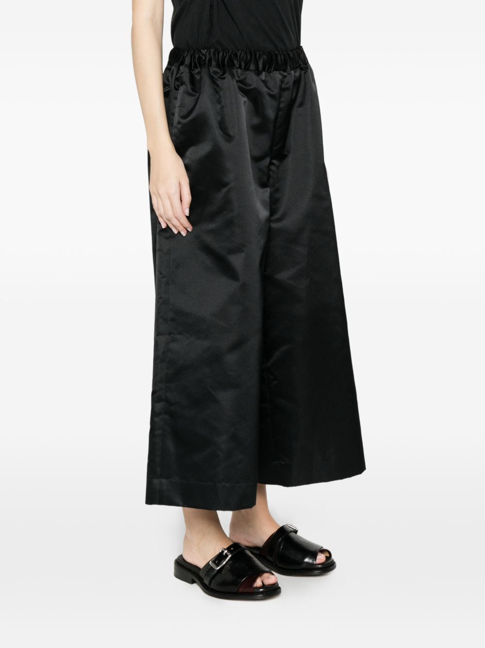 Pantaloni crop a gamba ampia  in nero Comme des garcons - donna 