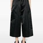 Pantaloni crop a gamba ampia  in nero Comme des garcons - donna 