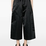 Pantaloni crop a gamba ampia  in nero Comme des garcons - donna 