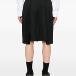 Bermuda con bettaglio plissettato in nero Comme Des Garçons Black - unisex 