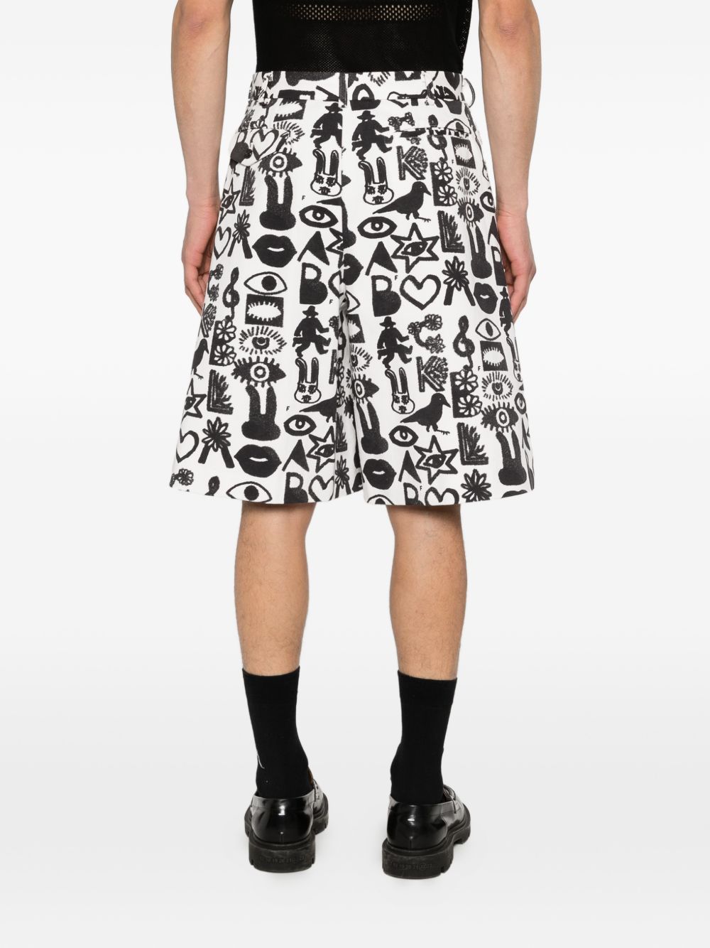 Shorts con stampa Fantasia in nero e bianco Comme des garcons black - unisex 