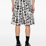 Shorts con stampa Fantasia in nero e bianco Comme des garcons black - unisex 