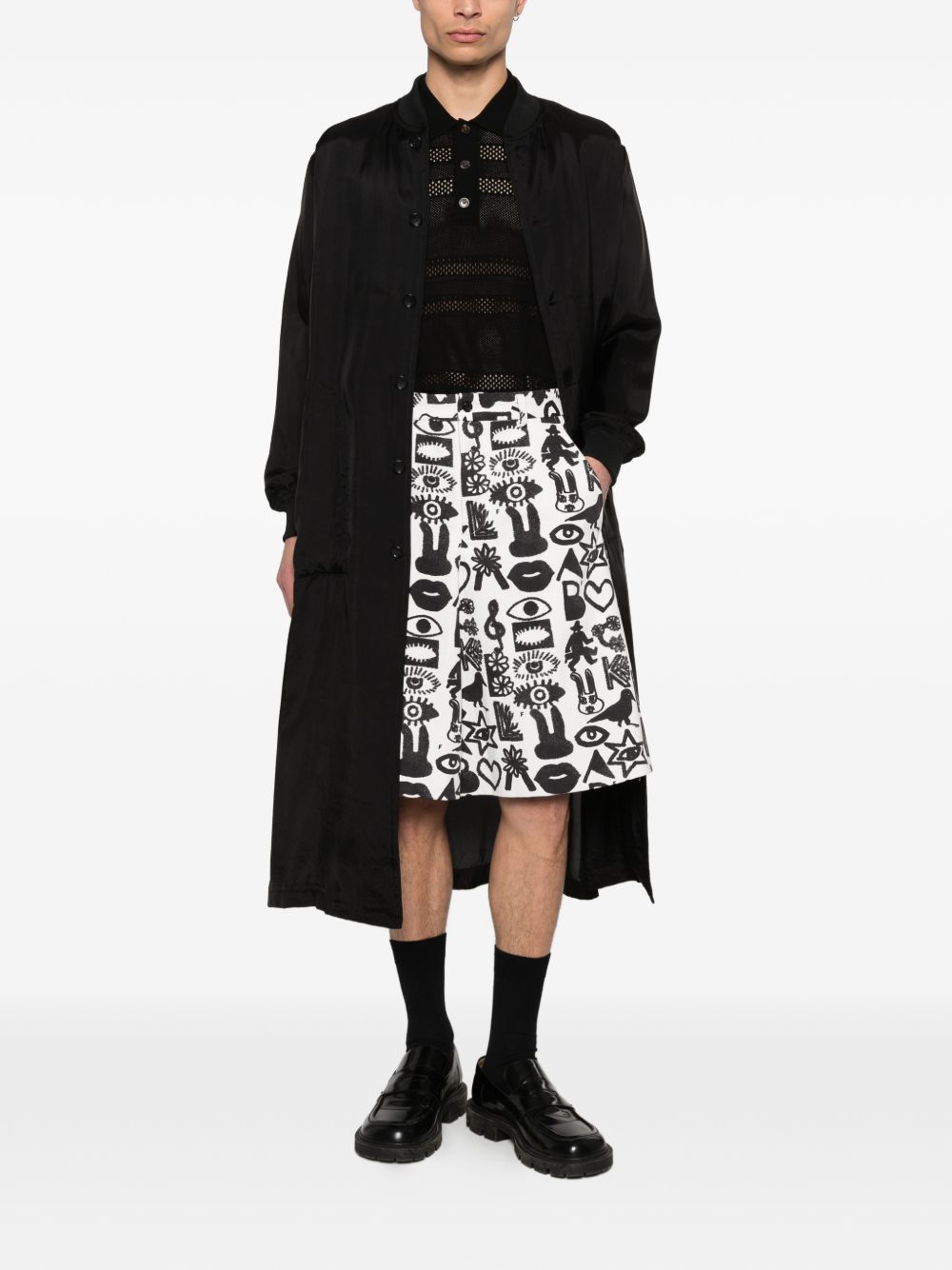 Shorts con stampa Fantasia in nero e bianco Comme des garcons black - unisex 