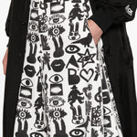 Shorts con stampa Fantasia in nero e bianco Comme des garcons black - unisex 