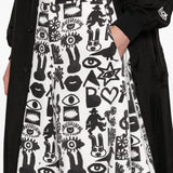 Shorts con stampa Fantasia in nero e bianco Comme des garcons black - unisex 
