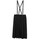 Gonna midi a pieghe con bretelle in nero COMME DES GARCONS BLACK - donna 
