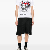 T-shirt con stampa in bianco e nero  Comme Des Garçons Black  x Nike - unisex 