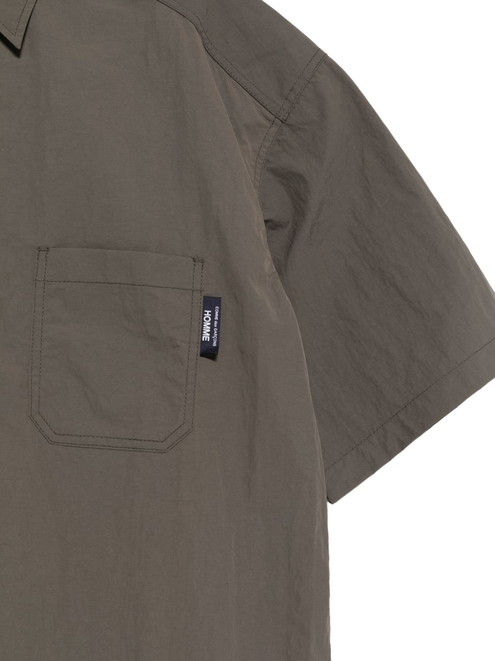 Camicia a maniche corte con patch logo in verde Comme des garcons homme - uomo 