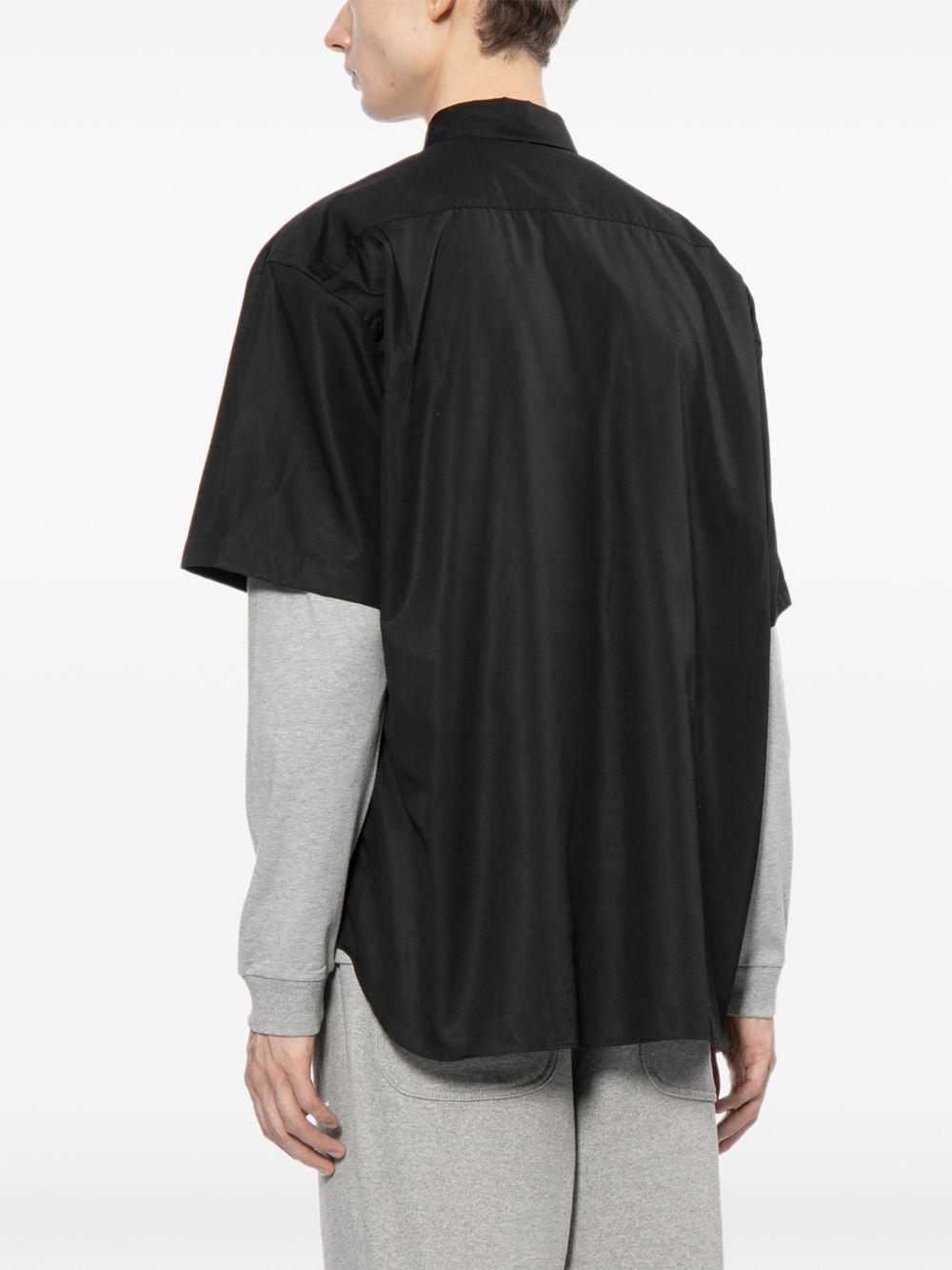 Camicia con logo ricamato in nero COMME DES GARCONS HOMME - uomo 