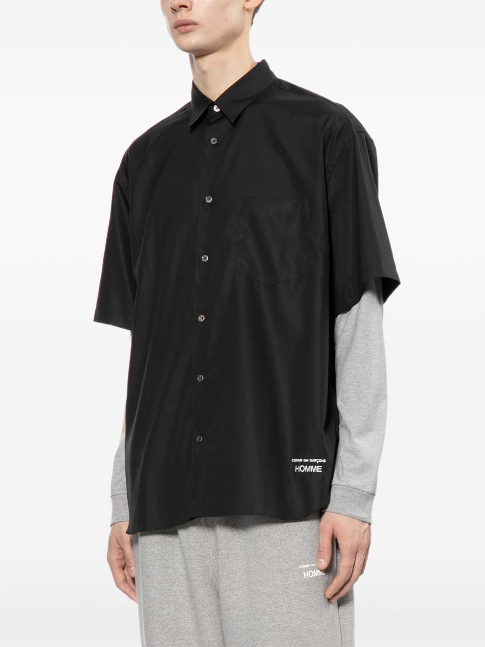 Camicia con logo ricamato in nero COMME DES GARCONS HOMME - uomo 