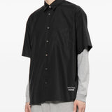 Camicia con logo ricamato in nero COMME DES GARCONS HOMME - uomo 