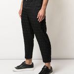 Pantaloni con trama geometrica in nero Comme des Garçons Homme Plus - uomo 