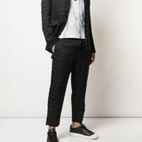 Pantaloni con trama geometrica in nero Comme des Garçons Homme Plus - uomo 