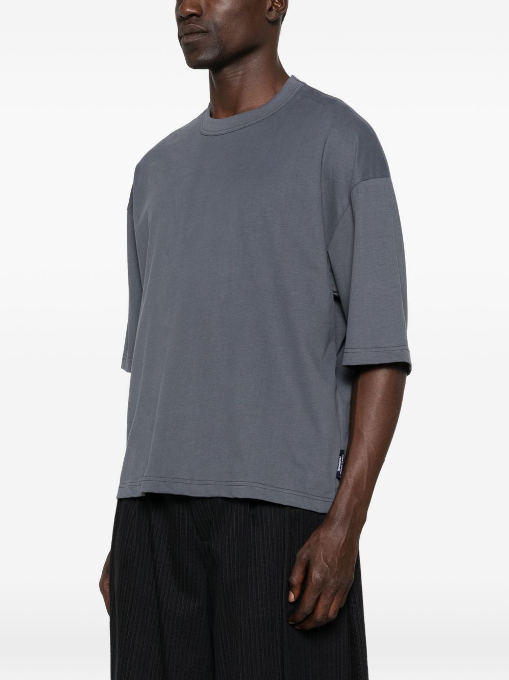 T-shirt a maniche corte con pannelli in grigio Comme des garcons homme - uomo 
