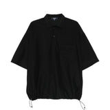 Polo con orlo elasticizzato in nero Comme des garcons homme - uomo 