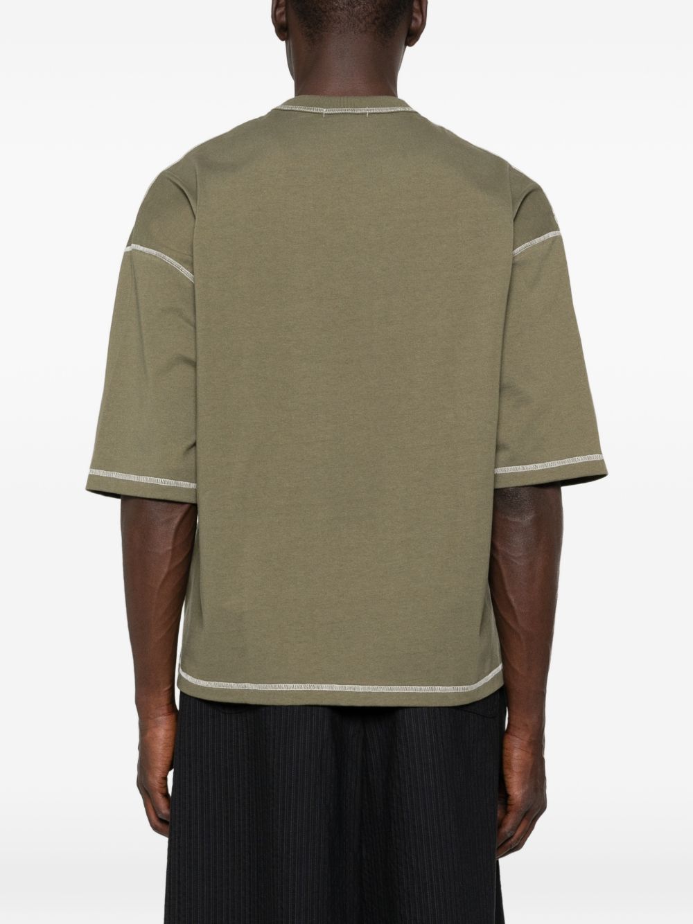 T-shirt con cuciture a contrasto in verde Comme des garcons homme - uomo 