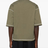 T-shirt con cuciture a contrasto in verde Comme des garcons homme - uomo 