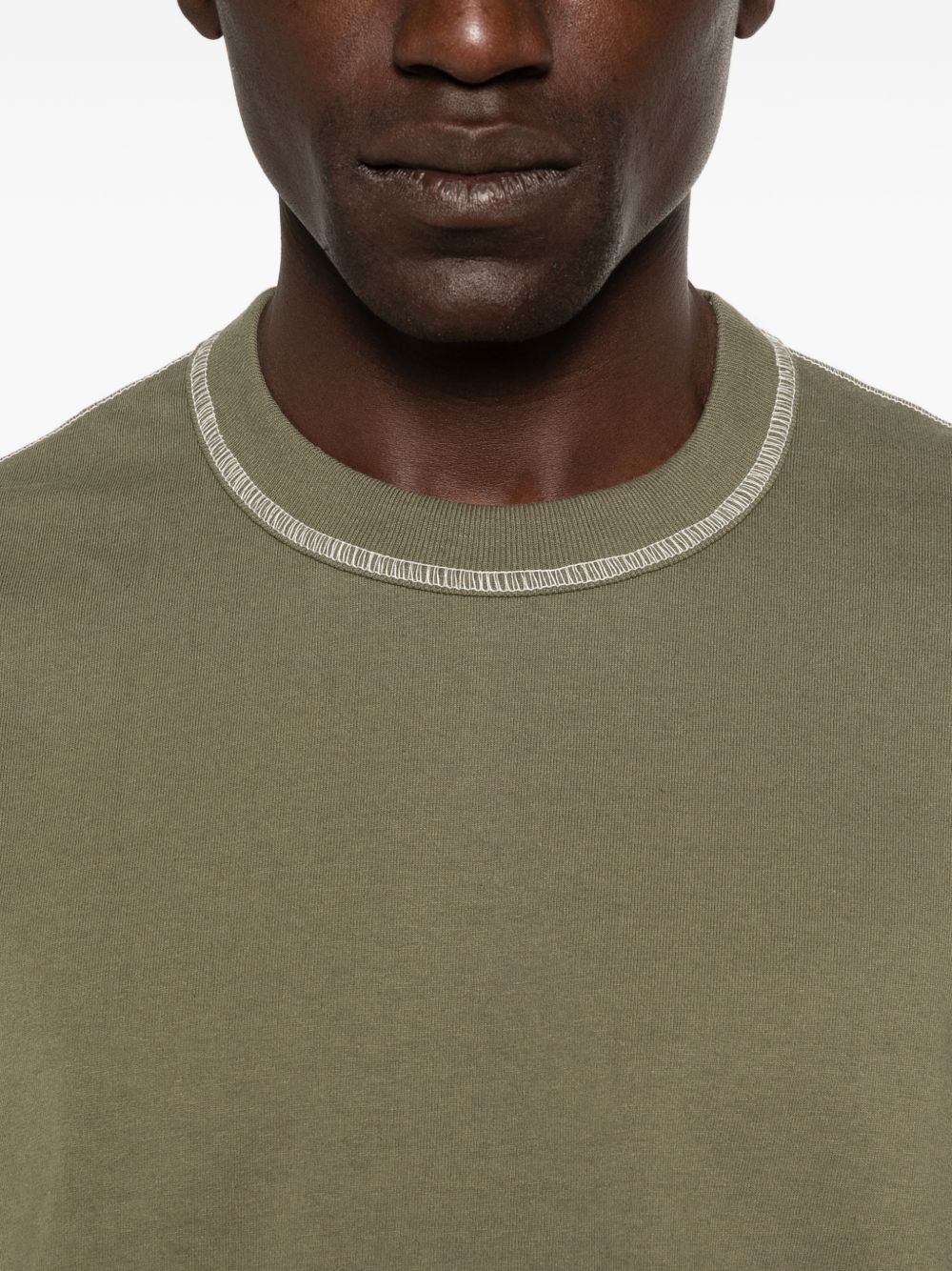 T-shirt con cuciture a contrasto in verde Comme des garcons homme - uomo 