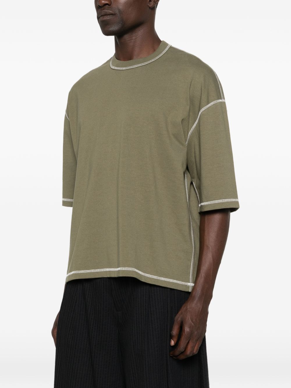 T-shirt con cuciture a contrasto in verde Comme des garcons homme - uomo 