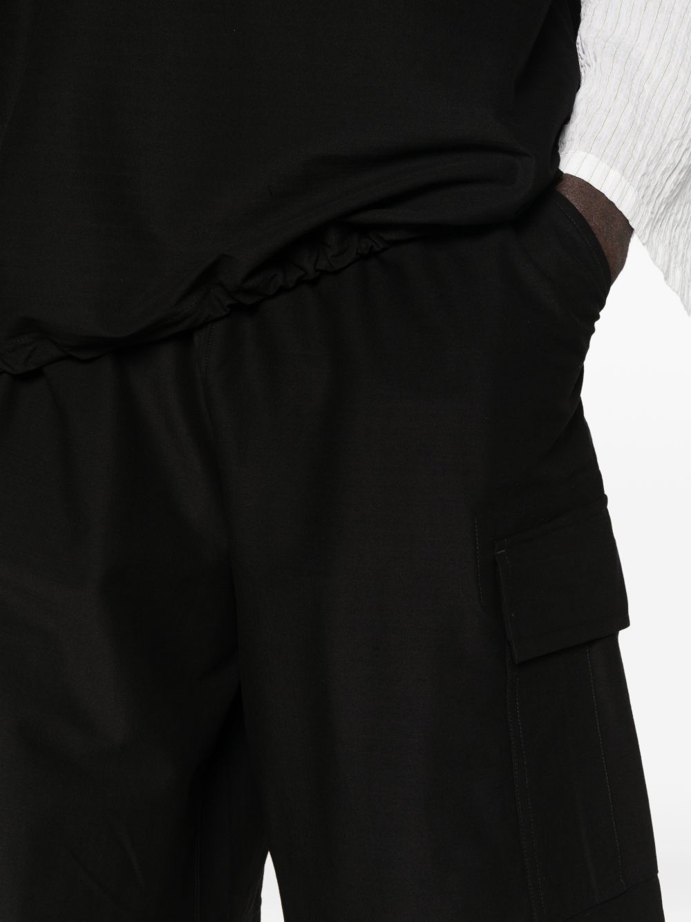 Pantaloncini cargo con coulisse in nero Comme des garcons homme - uomo 