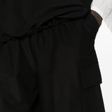 Pantaloncini cargo con coulisse in nero Comme des garcons homme - uomo 