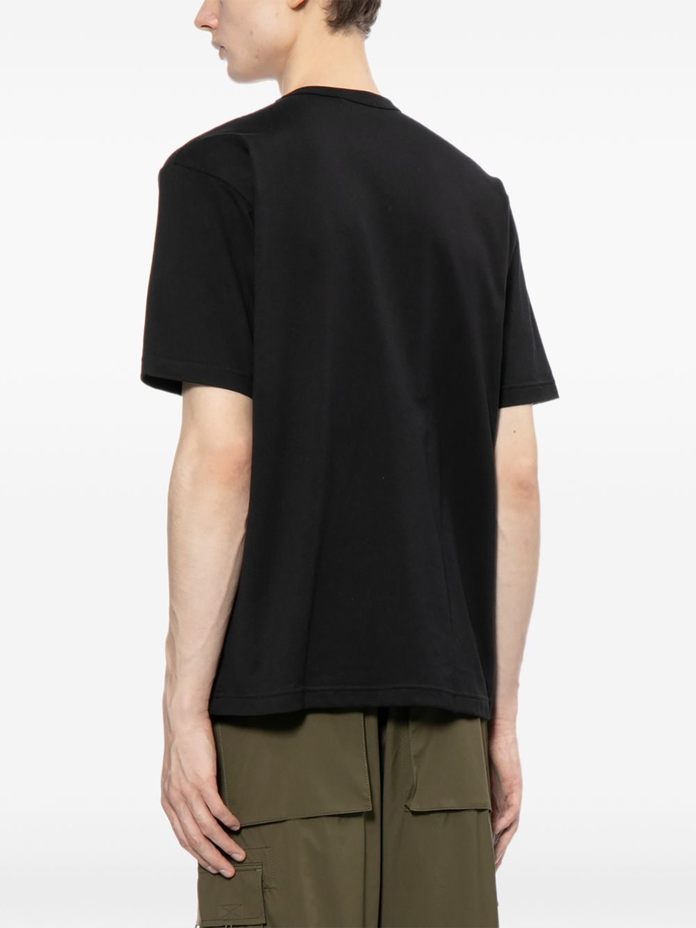 T-shirt con logo in nero Comme des garcons homme - uomo 