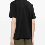 T-shirt con logo in nero Comme des garcons homme - uomo 