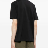T-shirt con logo in nero Comme des garcons homme - uomo 