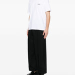 T-shirt con logo in bianco Comme des garcons homme - uomo 