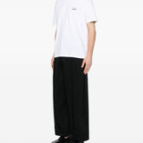 T-shirt con logo in bianco Comme des garcons homme - uomo 