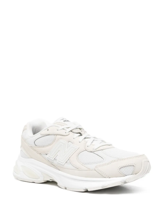 Sneakers basse con logo in beige Comme des garcons homme x new balance  - uomo 