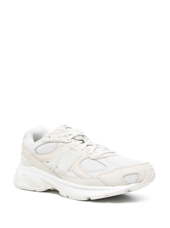 Sneakers basse con logo in beige Comme des garcons homme x new balance  - uomo 