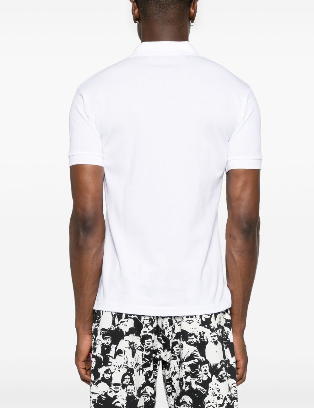 Polo con applicazione in bianco Comme des garcons play - uomo 