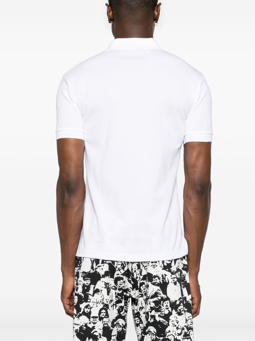 Polo con applicazione in bianco Comme des garcons play - uomo 