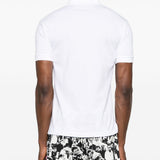 Polo con applicazione in bianco Comme des garcons play - uomo 