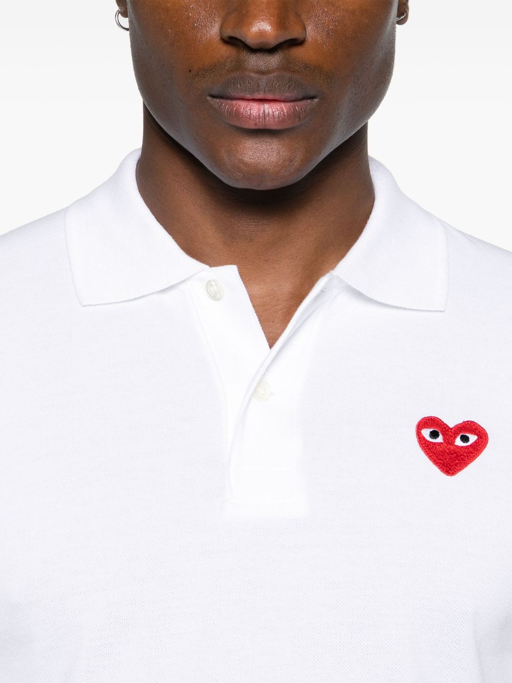 Polo con applicazione in bianco Comme des garcons play - uomo 