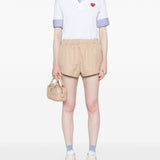 Polo con applicazione in bianco Comme des garcons play - uomo 