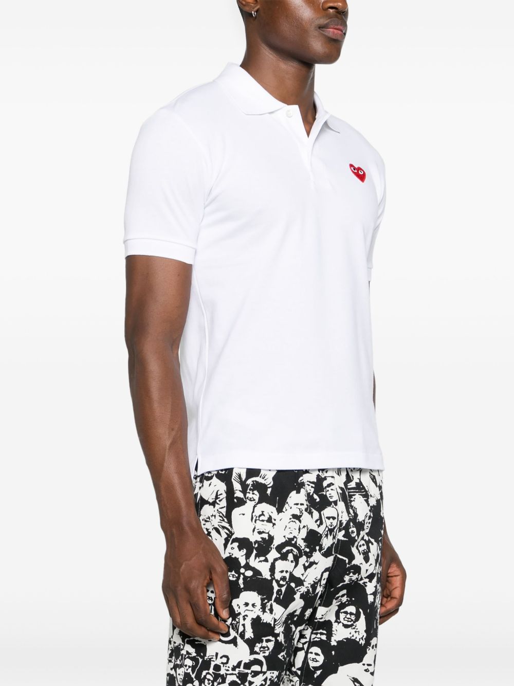 Polo con applicazione in bianco Comme des garcons play - uomo 