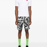 Polo con applicazione in bianco Comme des garcons play - uomo 