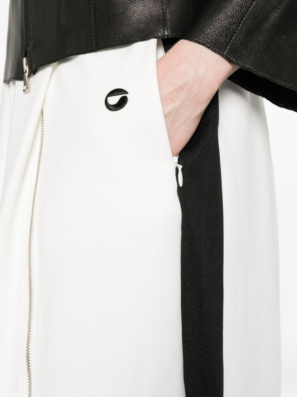 Pantaloni con zip in bianco Coperni - donna 