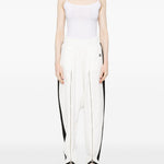 Pantaloni con zip in bianco Coperni - donna 