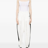 Pantaloni con zip in bianco Coperni - donna 