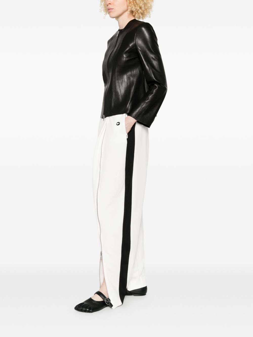 Pantaloni con zip in bianco Coperni - donna 