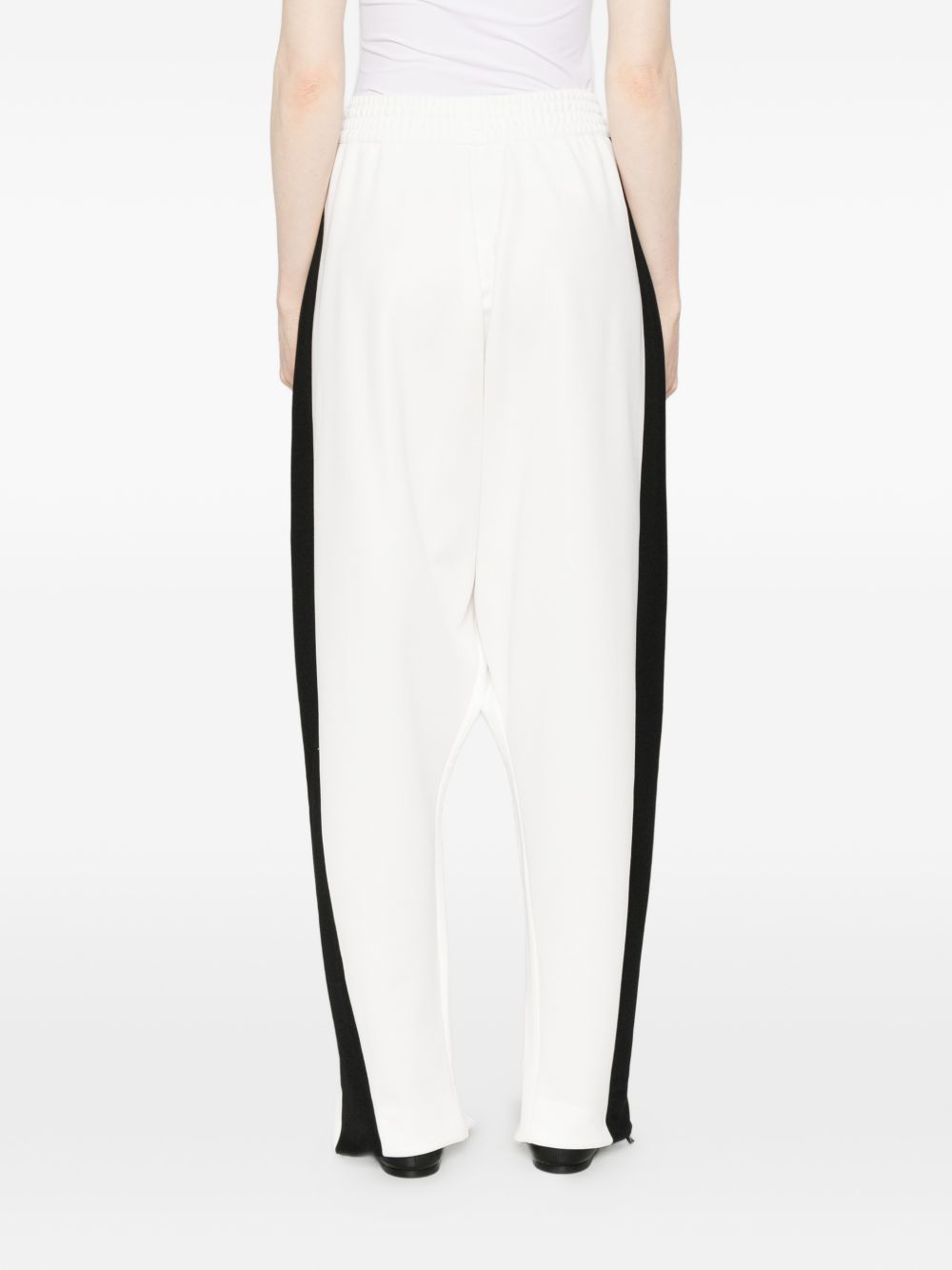 Pantaloni con zip in bianco Coperni - donna 