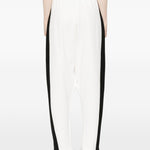 Pantaloni con zip in bianco Coperni - donna 