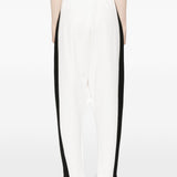 Pantaloni con zip in bianco Coperni - donna 
