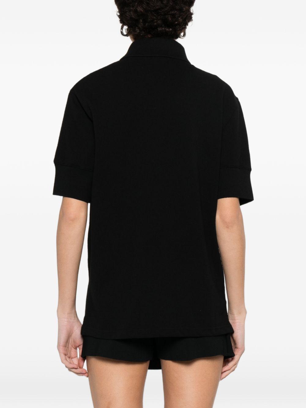 T-shirt polo con logo e toppa in nero Courrèges - donna 